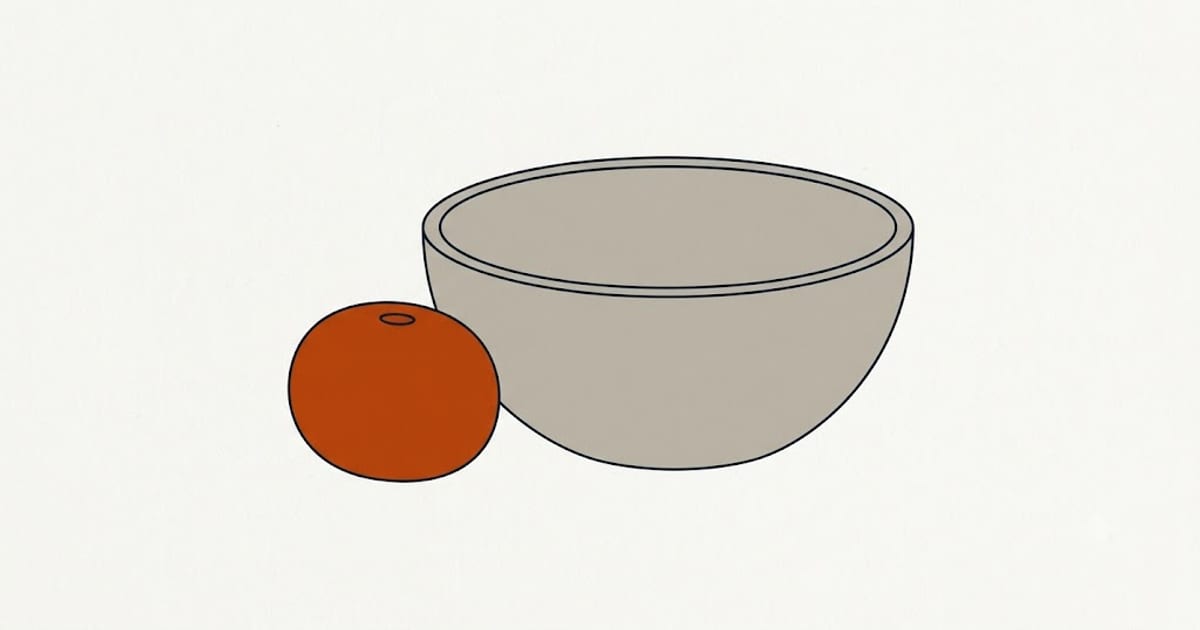 A single grape beside a dog bowl
